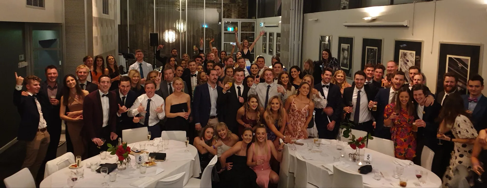 A large group of Uraidla Districts members dressed up at a club dinner
